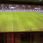 Screen Goo High Contrast screen, powered by a BenQ Model TH680 projector provides soccer action at Heraclion